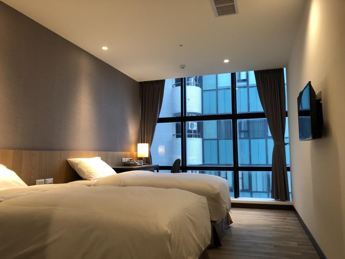 טאויואן Honest & Warm Hotel מראה חיצוני תמונה