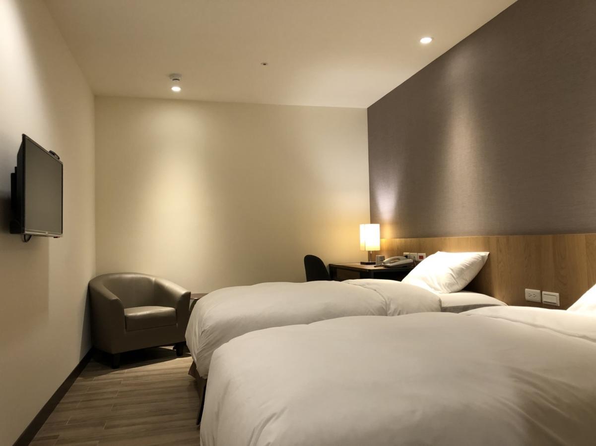 טאויואן Honest & Warm Hotel מראה חיצוני תמונה