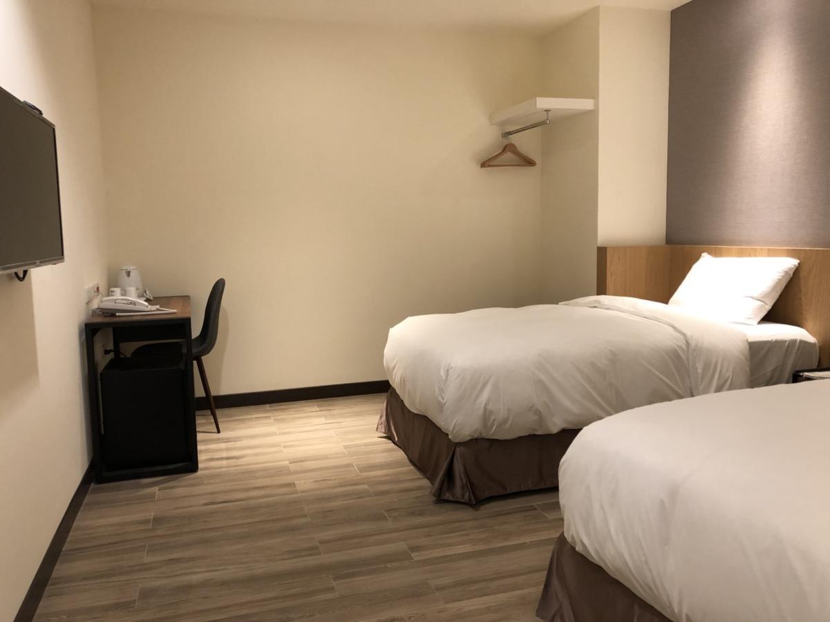 טאויואן Honest & Warm Hotel מראה חיצוני תמונה
