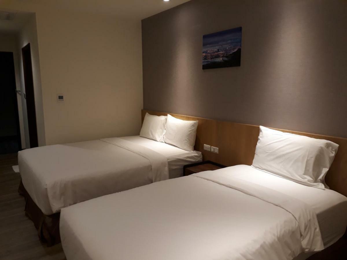 טאויואן Honest & Warm Hotel מראה חיצוני תמונה